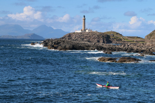 Ardnamurchan Point Lighthouse, Muck & Rum behind Sea Kayak Ardnamurchan Point Lighthouse