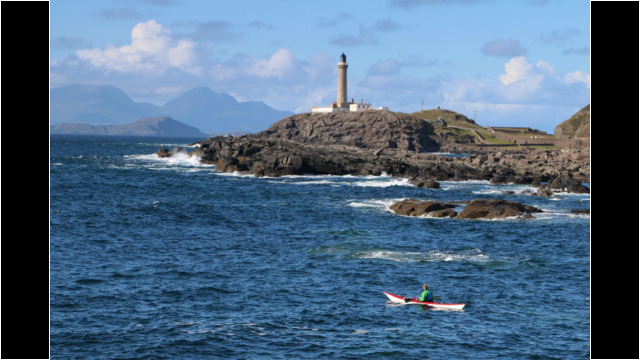 Ardnamurchan Point Lighthouse, Muck & Rum behind Sea Kayak Ardnamurchan Point Lighthouse