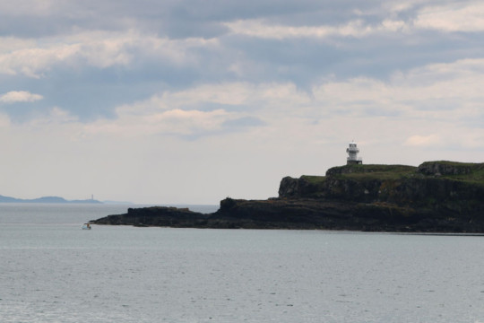 Eilean Chathastail Light & Adnamurchan Point, from Eigg Sea Kayak Eigg Muck Lighthouse