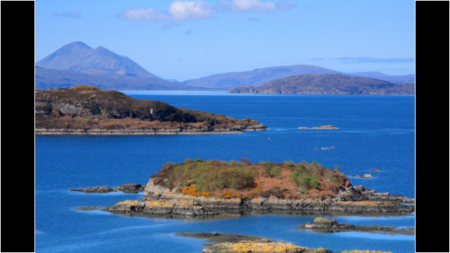 Plockton Islands, Skye behind Sea Kayak Plockton