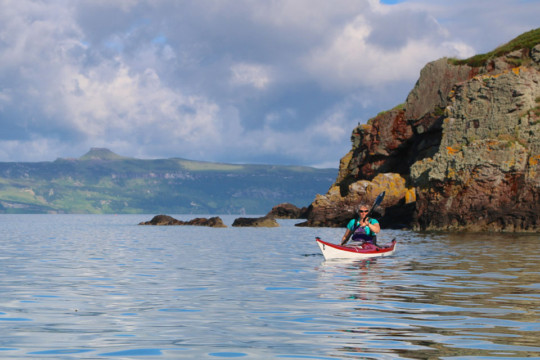 Crowlin Island Cliffs, Raasay behind Sea Kayak Crowlin Islands
