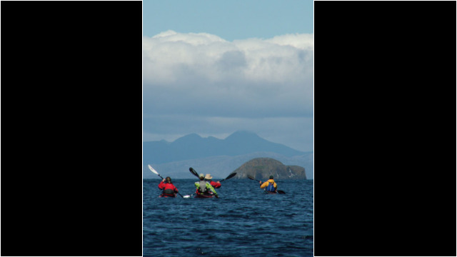 Gaeilavore Island, Hebrides behind Sea Kayak Fladda-chuain Skye