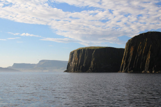 Lord Macdonald's Table, Skye behind Sea Kayak Fladda-chuain Skye