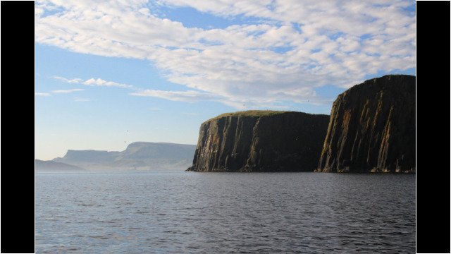 Lord Macdonald's Table, Skye behind Sea Kayak Fladda-chuain Skye