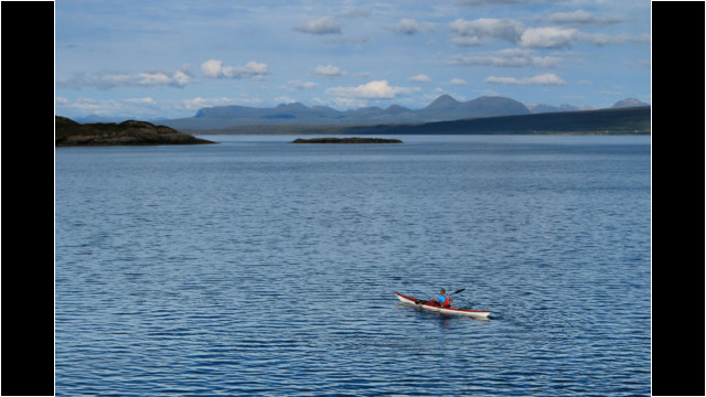 Caolas Rona & NW Highlands behind Sea Kayak Raasay Rona