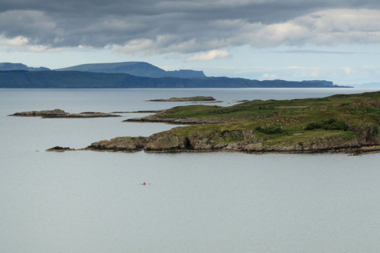 Eilean Fladday, Skye behind Sea Kayak Raasay Rona