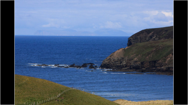 Melvich Bay, Orkney beyond Sandside Head Melvich Bay
