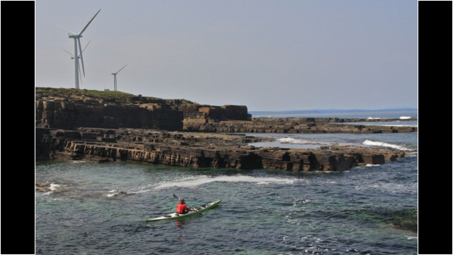 Leaving Crosskirk Bay Sea Kayak Holborn Head Wind Turbines