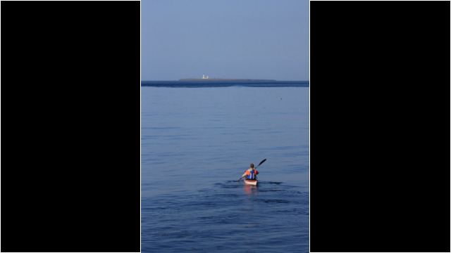 Heading out to Pentland Skerries Sea Kayak Pentland Skerries Lighthouse