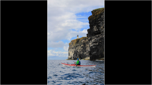 Copinsay's Lighthouse & cliffs Sea Kayak Orkney Copinsay Lighthouse