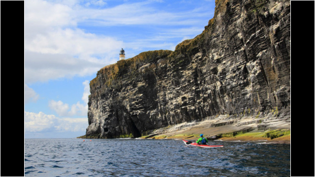 Copinsay's Lighthouse & cliffs Sea Kayak Orkney Copinsay Lighthouse