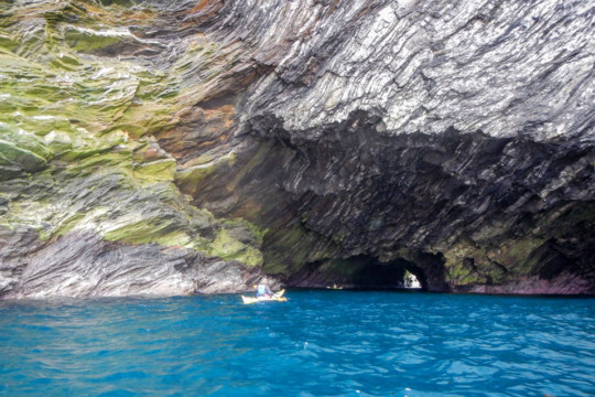 Colourful arch & cliff scenery Sea Kayak Shetland Muckle Flugga