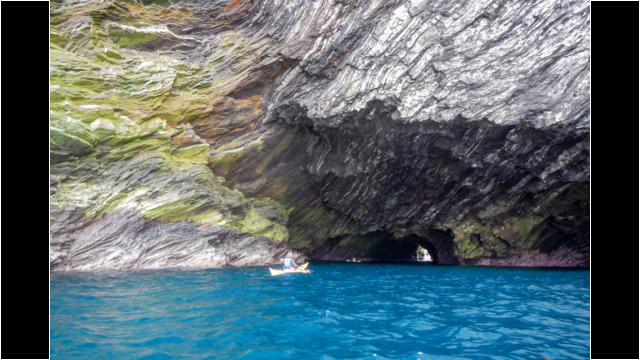 Colourful arch & cliff scenery Sea Kayak Shetland Muckle Flugga