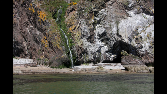 Waterfall beach North Sutor