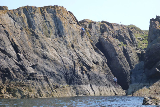Climbers at Redhythe point Sea Kayak Redhythe Point
